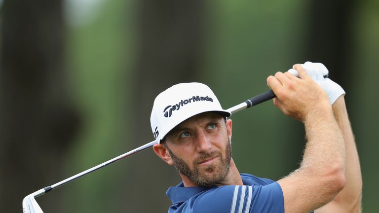 CHARLOTTE, NC - AUGUST 08:  Dustin Johnson of the United States plays his shot during a practice round prior to the 2017 PGA Championship at Quail Hollow C