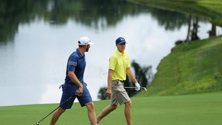 CHARLOTTE, NC - AUGUST 08:  Dustin Johnson and Jordan Spieth of the United States talk on the course during a practice round prior to the 2017 PGA Champion