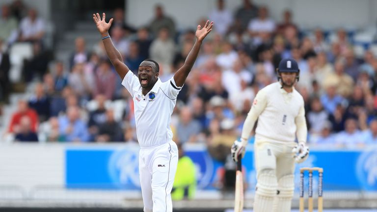 West Indies Kemar Roach celebrates the wicket of England's Mark Stoneman