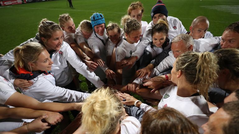 BELFAST, NORTHERN IRELAND - AUGUST 22:  England players and coaching staff celebrate following their team's 20-3 victory during the Women's Rugby World Cup