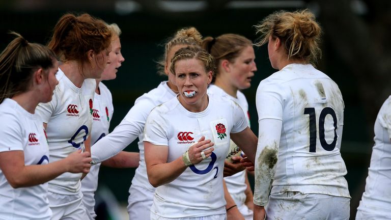 England team members celebrate after scoring a try during the Women's International Test match against Canada 