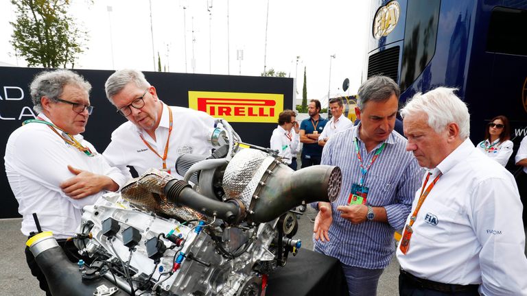 Didier Perrin, Ross Brawn and Charlie Whiting inspect the new F2 engine
