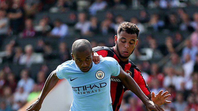 Fernandinho and Josh King in action during the Premier League match at the Vitality Stadium