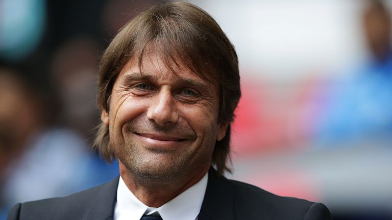 Antonio Conte is all smiles before the Premier League match between Tottenham Hotspur and Chelsea at Wembley Stadium
