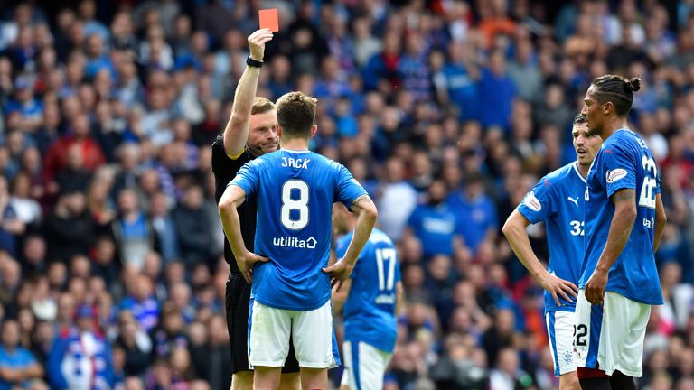 Ryan Jack clashes with Hibernian's Anthony Stokes and is shown a red card