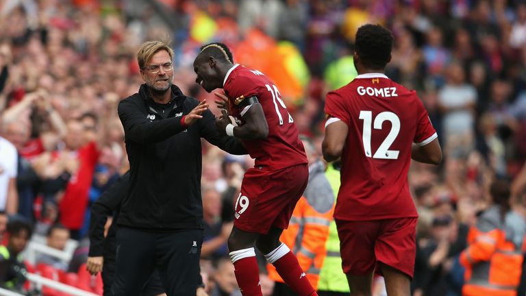 Sadio Mane of Liverpool celebrates scoring his side's first goal with Jurgen Klopp, Manager of Liverpool during the Premier League clash v Crystal Palace