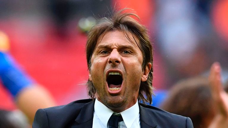 Antonio Conte celebrates on the pitch at Wembley following a 2-1 victory over Tottenham