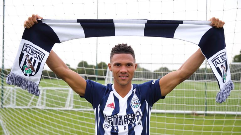Kieran Gibbs poses for a photograph after signing for West Bromwich Albion