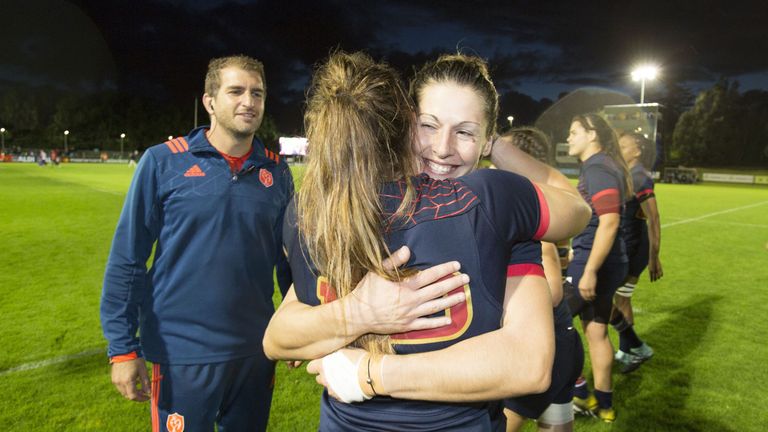 France's centre Elodie Poublan celebrates with France's centre Caroline Ladagnous on the pitch after the Women's Rugby World Cup 2017 pool C rugby match be