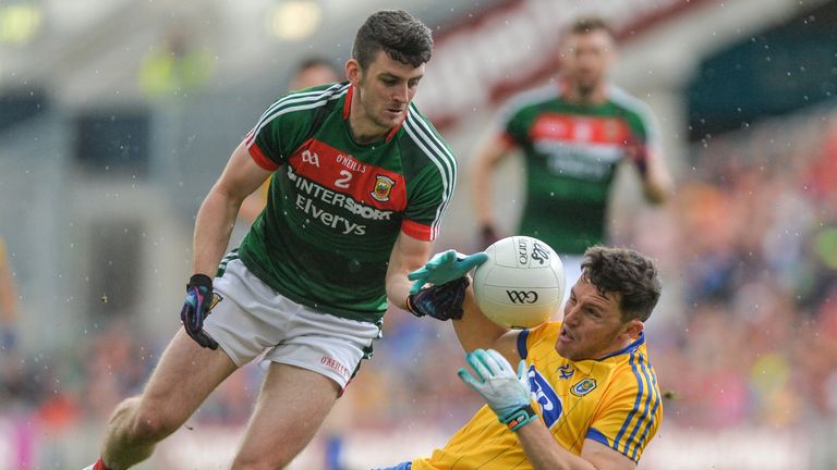 Diarmuid Murtagh of Roscommon in action against Brendan Harrison of Mayo during the GAA Football All-Ireland Senior Championship Quarter-Final match