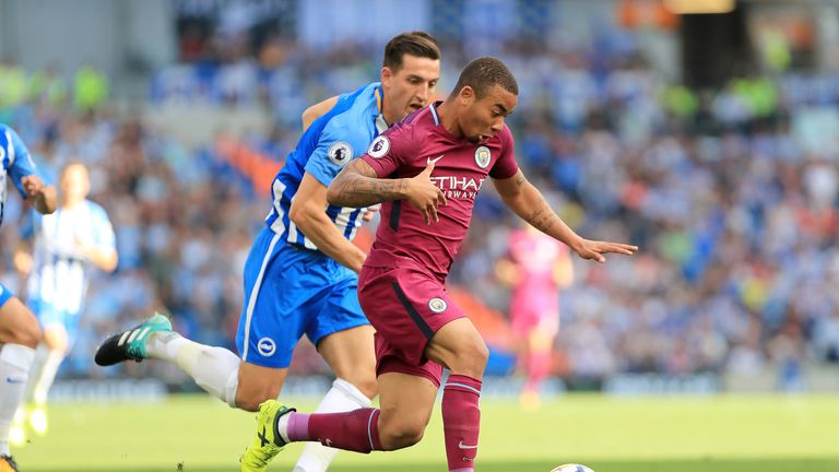 Lewis Dunk gives chase as Gabriel Jesus surges forward at the AMEX Stadium