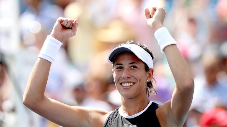 MASON, OH - AUGUST 20:  Garbine Muguruza of Spain celebrates her win over Simona Halep of Romania during the women's final on day 9 of the Western & Southe