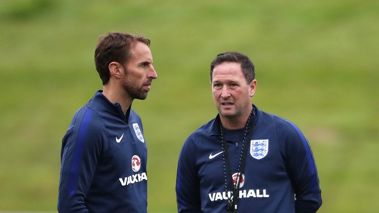 Gareth Southgate and first team coach Steve Holland during a training session at St Georges' Park