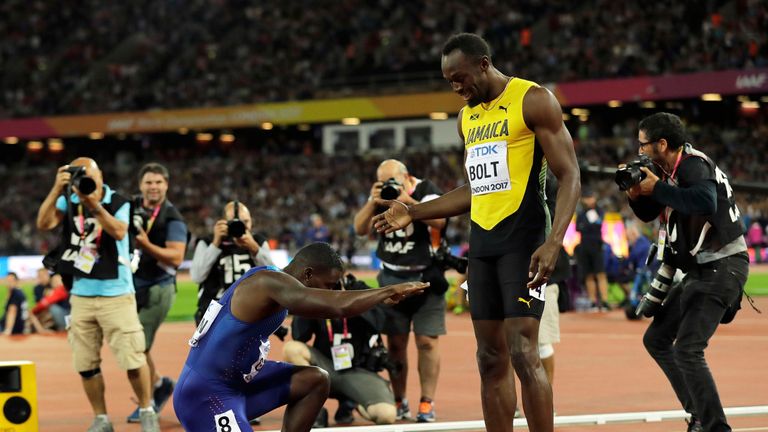 United States' Justin Gatlin bows to Jamaica's Usain Bolt after winning the Men's 100 meters final during the World Athletics Championships in London Satur