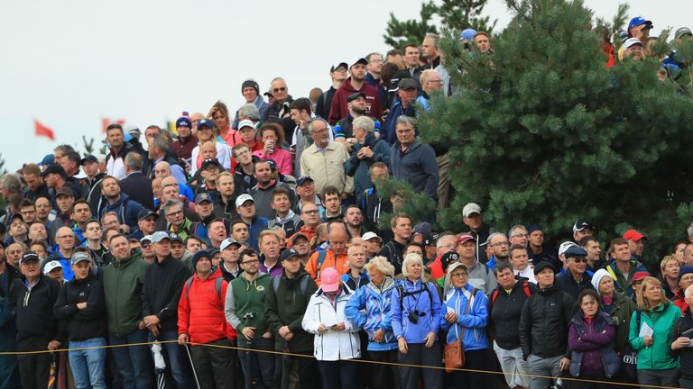 Golf fans watch the action on the 1st hole during the second round of the 146th Open Championship at Royal Birkdale on July 