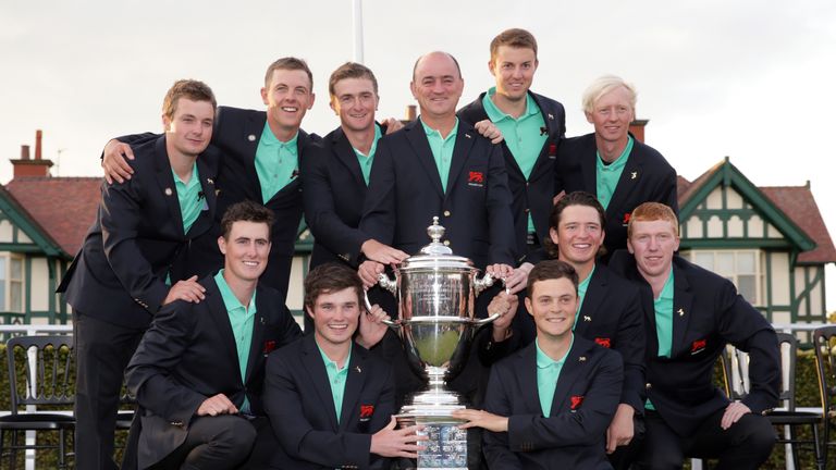 LYTHAM ST ANNES, ENGLAND - SEPTEMBER 13:  The Great Britain and Ireland Walker Cup Team celebrate their victory with the trophy during day two the 2015 Wal