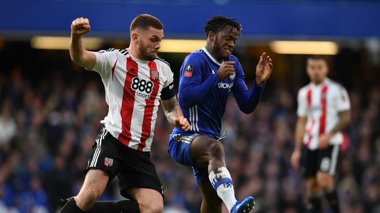 LONDON, ENGLAND - JANUARY 28: Michy Batshuayi of Chelsea and Harlee Dean of Brentford compete for the ball during the Emirates FA Cup Fourth Round match be