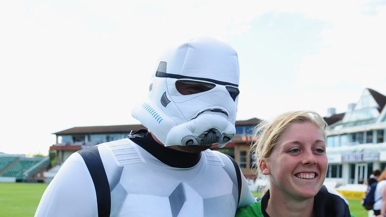 TAUNTON, UNITED KINGDOM - JULY 31: Heather Knight of Western Storm (R) poses with a spectator in a stormtroopers outfit during the KSL match between Wester