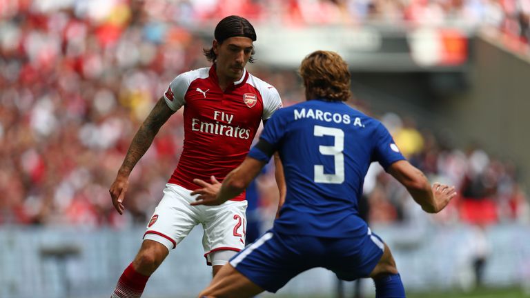 LONDON, ENGLAND - AUGUST 06: Hector Bellerin of Arsenal attempts to get past Marcos Alonso of Chelsea during the The FA Community Shield final between Chel