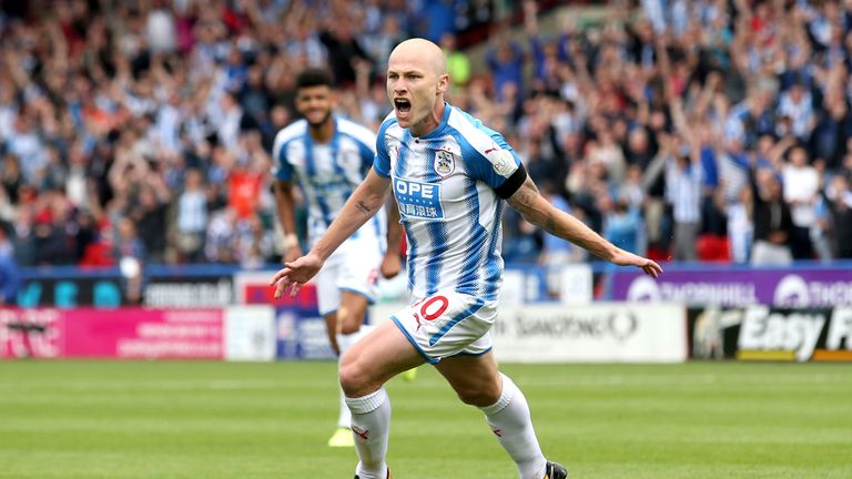 Aaron Mooy of Huddersfield Town celebrates scoring his sides first goal during the Premier League match between Huddersfield