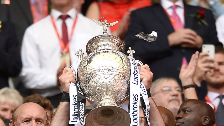 Gareth Ellis and Hull FC lift the Challenge Cup trophy