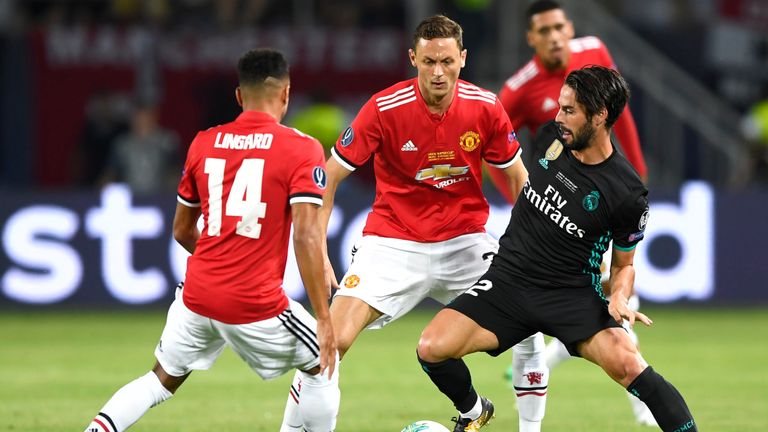 Isco holds off Nemanja Matic and Jesse Lingard