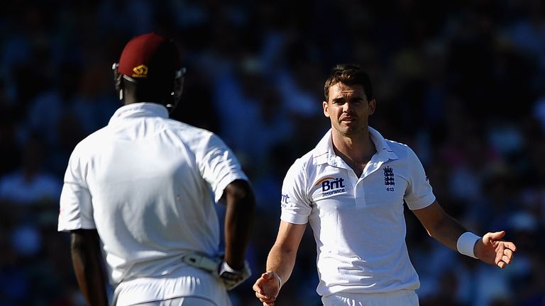 James Anderson of England exchanges words with Darren Sammy of West Indies during the Second Investec Test
