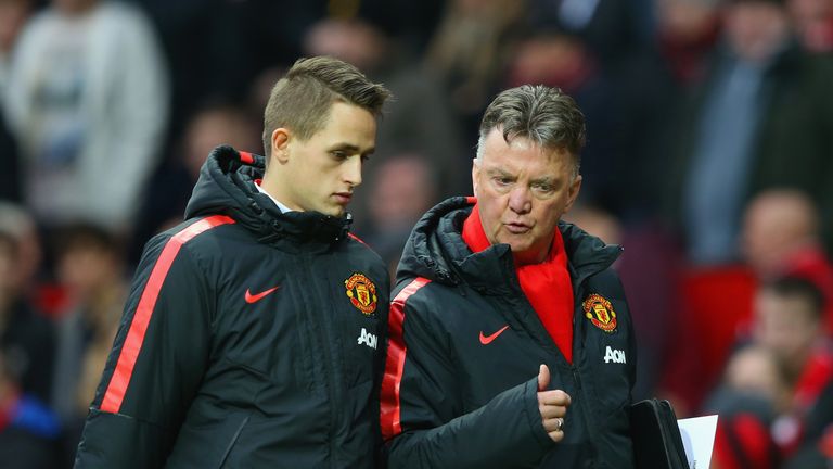 MANCHESTER, ENGLAND - FEBRUARY 28:  Manager Louis van Gaal of Manchester United speaks to Adnan Januzaj of Manchester United atr half time during the Barcl
