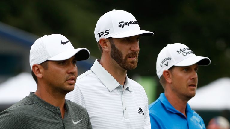 CHARLOTTE, NC - AUGUST 11: Jason Day of Australia, Dustin Johnson of the United States and Henrik Stenson of Sweden walk off the eighth tee during the seco