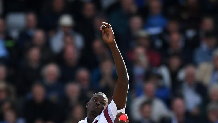 BIRMINGHAM, ENGLAND - AUGUST 18:  West Indies captain Jason Holder bowls during day two of the 1st Investec Test match between England and West Indies at E