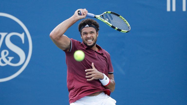 MASON, OH - AUGUST 18: Jo-Wilfried Tsonga of France hits a return to Steve Johnson of the United States during a third round match on Day 6 of the Western 