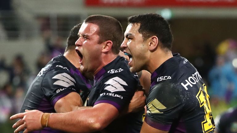 MELBOURNE, AUSTRALIA - AUGUST 12:  Joe Stimson of the Storm celebrates a try  during the round 23 NRL match between the Melbourne Storm and the Sydney Roos