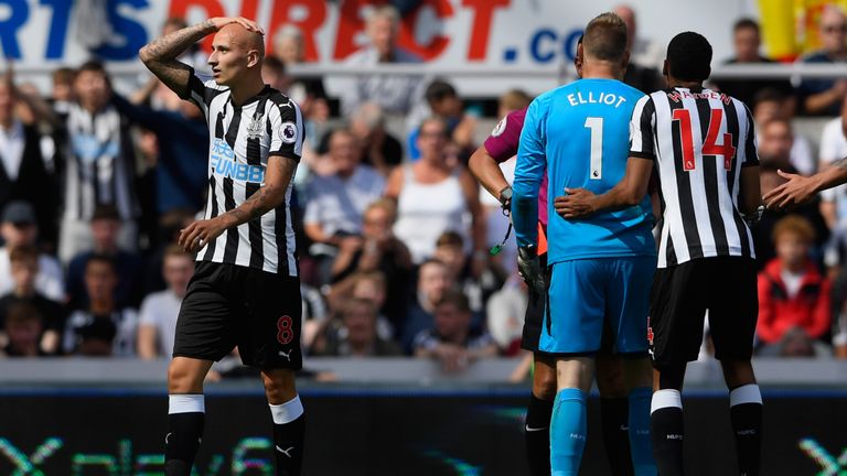 Jonjo Shelvey of Newcastle United is sent off after an incident with Dele Alli during the Premier League