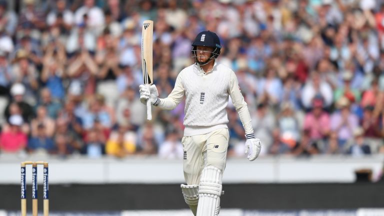 England's Jonny Bairstow celebrates scoring 50 not out during day two of the Fourth Investec Test at Emirates Old Trafford, Manchester.