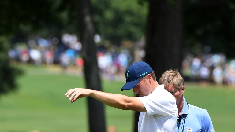 Jordan Spieth of the United States takes a ball drop on the seventh hole during the third round of the 2017 PGA Championship 