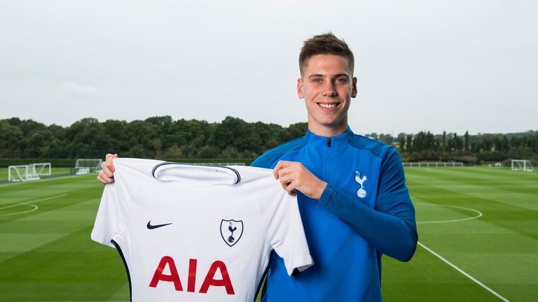 Juan Foyth poses at Tottenham's training ground after signing from Estudiantes