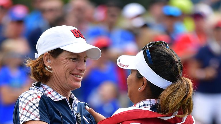 WEST DES MOINES, IA - AUGUST 20:  Juli Inkster, Captain of Team USA  celebrates with Lizette Salas on the 18th hole during the final day singles matches of