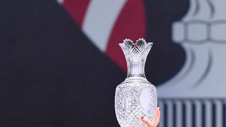WEST DES MOINES, IA - AUGUST 20:  Juli Inkster of the United States holds up the Solheim Cup after defeating Team Europe 16 1/2 to 11 1/2 during the final 