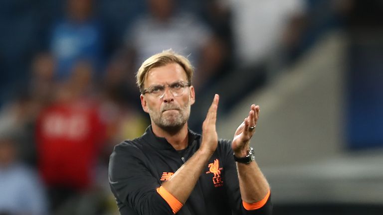 Juergen Klopp of Liverpool applauds the fans after the UEFA Champions League Qualifying Play-Offs Round First Leg match between 1899 Hoffenheim 