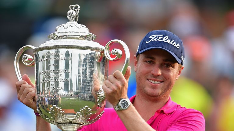 Justin Thomas of the United States poses with the Wanamaker Trophy after winning the 2017 PGA Championship