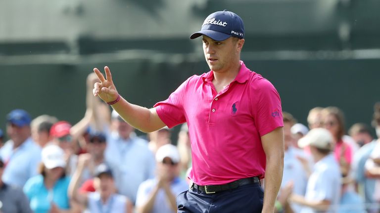 Justin Thomas of the United States reacts to his birdie putt on the 13th green during the final round of the 2017 PGA Championship