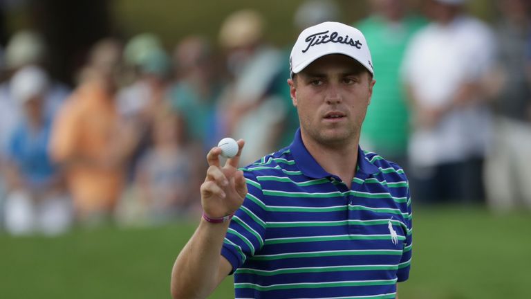 Justin Thomas of the United States reacts to his putt on the on the 10th green during the third round of the 2017 PGA Championship