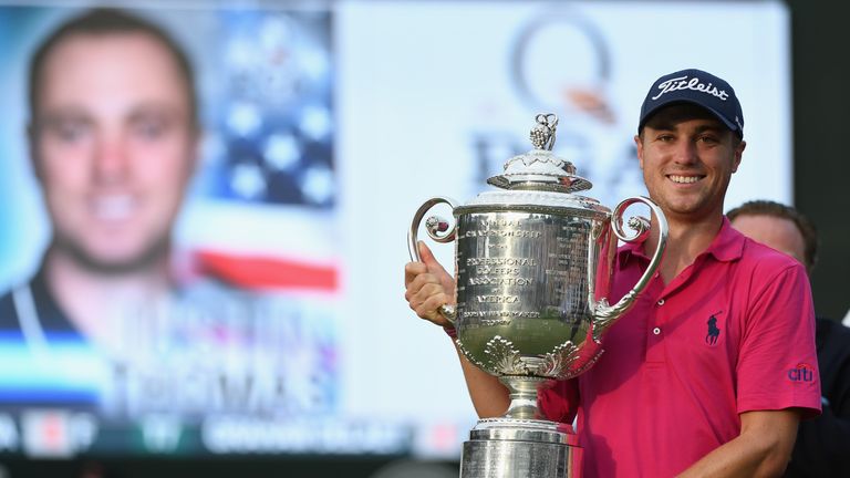 Justin Thomas poses with the Wanamaker Trophy