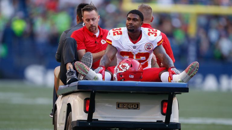 Running back Spencer Ware #32 of the Kansas City Chiefs leaves the game with an injury