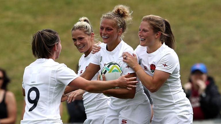 DUBLIN, IRELAND - AUGUST 09:  Kay Wilson of England celebrates with team mates after scoring her second try of the game during the Women's Rugby World Cup 