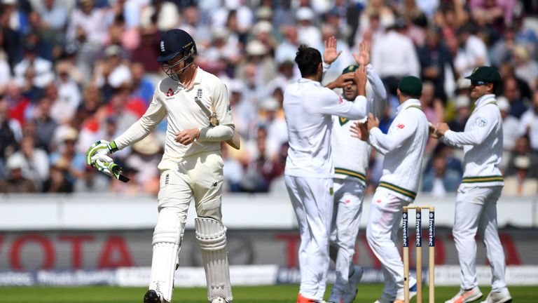 Keaton Jennings of England leaves the field after being dismissed by Duanne Olivier of South Africa