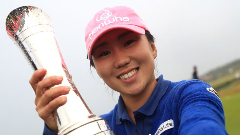 In-Kyung Kim of Korea poses with the trophy following her victory during the final round of the Ricoh Women's British Op