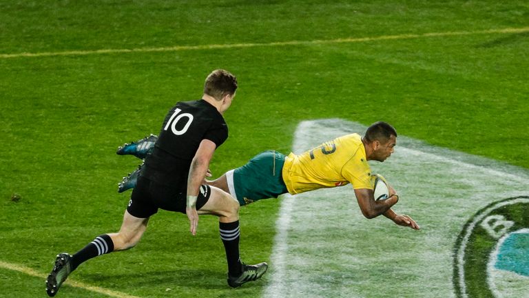 SYDNEY, NEW SOUTH WALES - AUGUST 19:  Kurtley Beale of the Wallabies dives in for a try during The Rugby Championship Bledisloe Cup match between the Austr