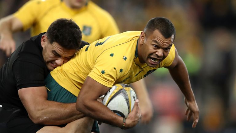 SYDNEY, AUSTRALIA - AUGUST 19: Kurtley Beale of the Wallabies is tackled  during The Rugby Championship Bledisloe Cup match between the Australian Wallabie