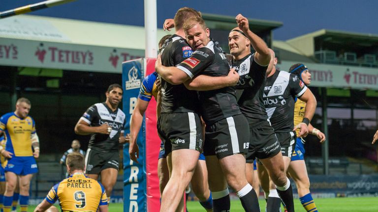 Hull FC's Danny Washbrook and Danny Houghton congratulated Scott Taylor on his try against Leeds.